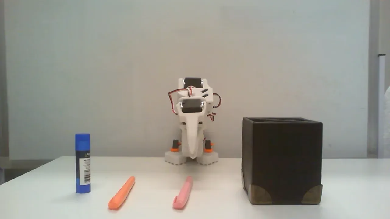Front camera view of the Bus Table (Easy) workspace with a small number of objects to clear.